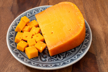 Cheese collection, Dutch ripe hard chees made from cow milk in the Netherlands in piece and in blocks close up