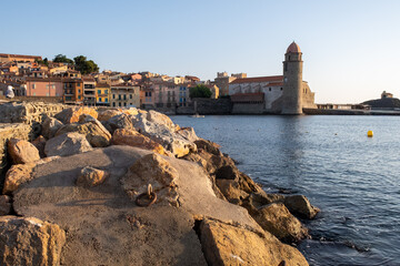 View of colourful Collioure, narrow streets and yellow, pink, orange houses, summer vacation...