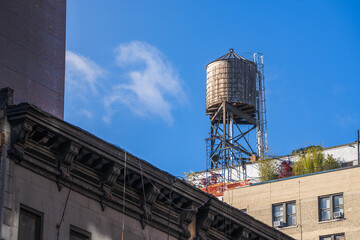 Water tower on a rooftop in NYC