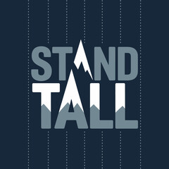 Stand tall motivational typography with mountain peaks integrated into the letters conveying strength resilience and aspiration against a dark textured background
