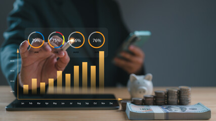 Businessman analyzing financial data on virtual dashboard with growth chart. Concept investment, savings, wealth management, using technology planning business profit, success, financial goals.