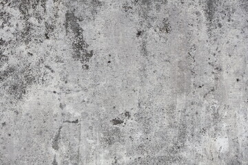 Cement walls that change texture due to exposure to weather