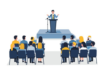 Speaker presenting to an audience in chairs on laptops