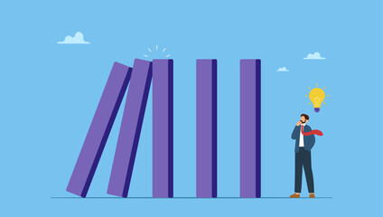 Courage businessman thinking look at collapsing domino effect. Risk management, uncertainty or unknown threat causing business failure, economic crisis, danger or problem, security and safety.