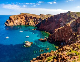 Coastal cliffs meet turquoise water