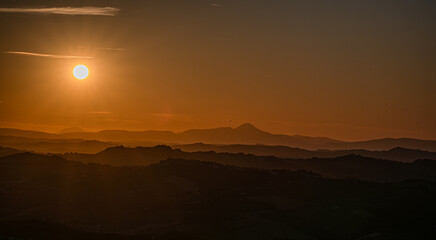 Marche, spectacular view and sunset on the Marche hills from the Ripatransone viewpoint.