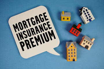 MIP Mortgage Insurance Premium text with house models on blue background