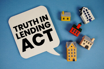 TILA Truth in Lending Act text with house models on blue background