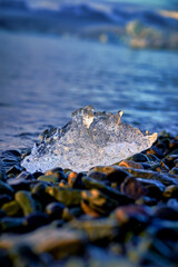 The ice on the black stone beach in jokulsarlon glacier lagoon , Travel road trip in Iceland.
