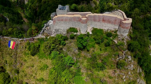Aerial footage of the Poenari Castle (Cetatea Poenari), situated on top of a mountain in Romania