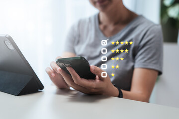 Close-up of a consumer checking star ratings and reviews on a smartphone before purchasing. Concept of online shopping research, social proof, decision making, trust, and digital marketing analytics