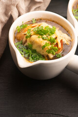 French Onion Soup with Baguette, Cheese and Parsley
