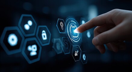 A hand interacts with a futuristic interface.  A finger touches a glowing, central icon on a dark background, surrounded by other illuminated icons.  Data and information graphic elements are visible