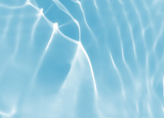 Abstract blurred shades of blue water background. Light and shadow ripples or splashes surface of water texture. Water waves with shining and reflection pattern photography for​ design artwork.