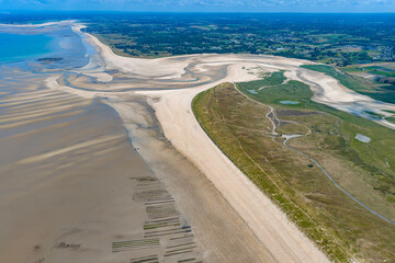 Aerial view of coast of Cotentin Peninsula beach and tides at Bricqueville-sur-Mer - Route...