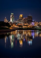 night meeting with lit city skyline