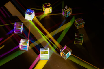 Crystal cube prism with refraction and holographic effect on dark background