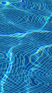 The water in the pool is blue, permeated with glitter and shimmer in the sun. Healthy lifestyle. Recreation for children.