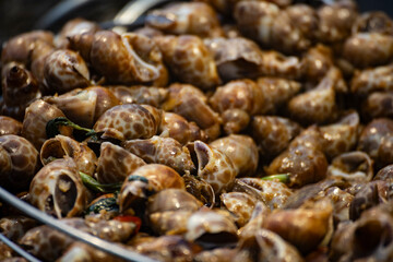  a classic Taiwanese night market delicacy—stir-fried snails