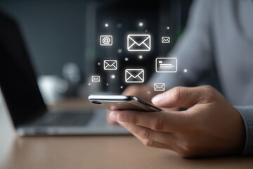 Handheld Smartphone with Floating Mail Icons  Mobile Messaging