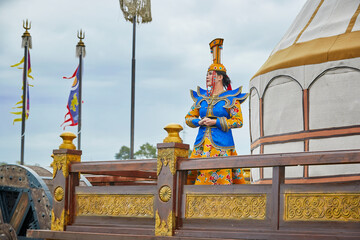 Mongolian girls dressed in luxurious Mongolian costumes on the Mongolian war chariots of the...