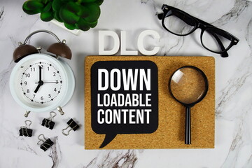 DLC - Downloadable Content acronym with alarm clock and magnifying glass, business concept background