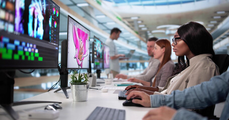 Professional Graphic Designer Utilizing Video Editing Software