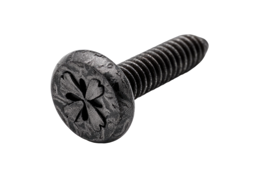 A metal screw with a decorative, etched four-leaf clover pattern on its head
