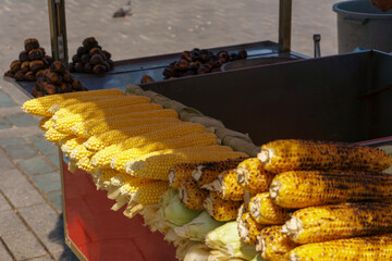 Turkish street food vendor selling boiled and grilled corn with roasted chestnuts at Eminönü Square