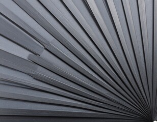 Dark gray, radiating slats forming a fan-like pattern