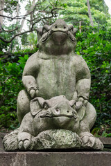 Fototapeta premium Balinese Ancient Stone Statues and Mythological Sculptures. Traditional Carvings of Frogs, Dragons, Devils, Deities and Guardians at Sacred Monkey Forest Sanctuary Ubud Bali Indonesia.