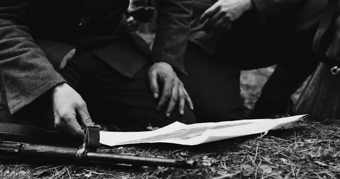 Historical Re-enactment Black And White Video. World War II German wehrmacht Soldier officer Commander Soldiers Of World War II Briefs, Showing Direction Of A Attack On Map
