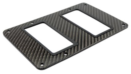 Carbon fiber plate with two rectangular openings and a textured weave pattern, isolated on a transparent background