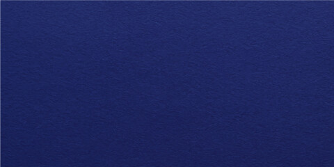 Close-up macro of a dark blue denim fabric texture pattern