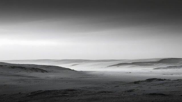 Monochrome Landscape with Rolling Hills and Misty Horizon