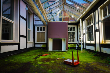 overgrown winter garden of a lost place hotel
