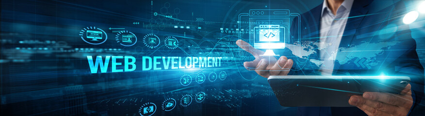 Developer using tablet analyzing web development framework data coding, UX automation integration design optimization testing performance deployment.