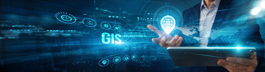 Analyst using tablet analyzing GIS mapping data geolocation, spatial automation visualization integration monitoring planning performance solutions.