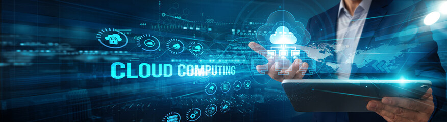 Specialist using tablet analyzing cloud computing platform data scalability, storage automation performance integration virtualization monitoring solutions.