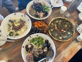 Overhead Shot of Korean Cuisine on Wooden Table