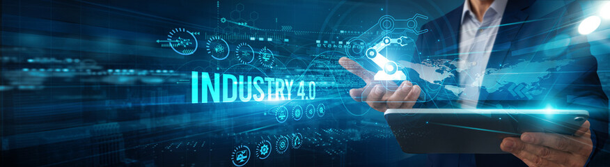 An engineer using a tablet analyzing Industry 4.0 smart factory data automation, monitoring robotics IoT integration efficiency innovation optimization, and performance.