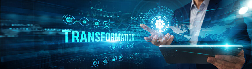 The leader is using a tablet to analyze transformation process data innovation and monitor scalability efficiency optimization integration automation performance.