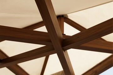 Close-up of Wooden Structure with Beige Canopy