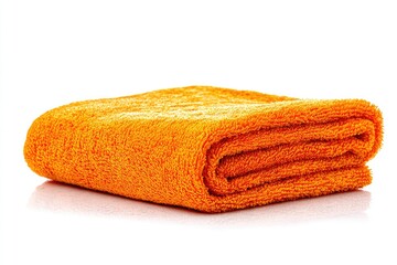 Folded orange towel on white background