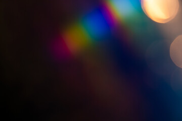 light leak overlay effect with blur bokeh rainbow light leaks,retro noisy film texture light leak flare on black background,abstract colorful background with bokeh © ZMC-Studio
