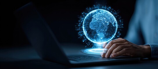 Holographic Earth displayed on a laptop.  Hands interacting with a digital globe