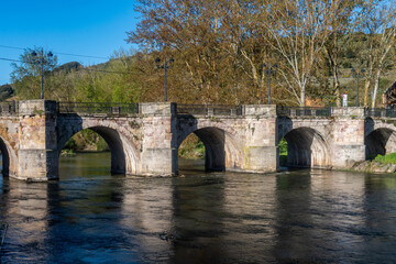Fototapeta premium Stone bridge over the Pisuerga River in Alar del Rey Palencia Castilla y Leon