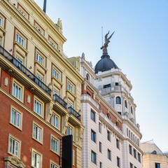 Fototapeta premium Emblematic buildings of the Gran Via in Madrid in neoclassical style, Spain.