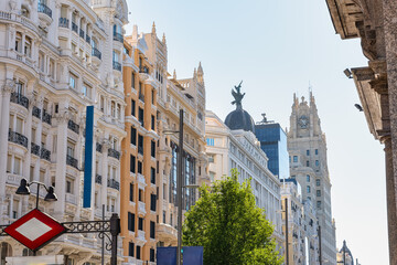 Spectacular classic-style buildings on both sides of the touristy Gran Via street in Madrid, Spain. © josemiguelsangar