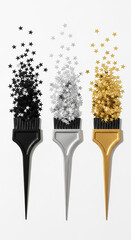 Three hair dye brushes with black silver and gold bristles dissolving into particles